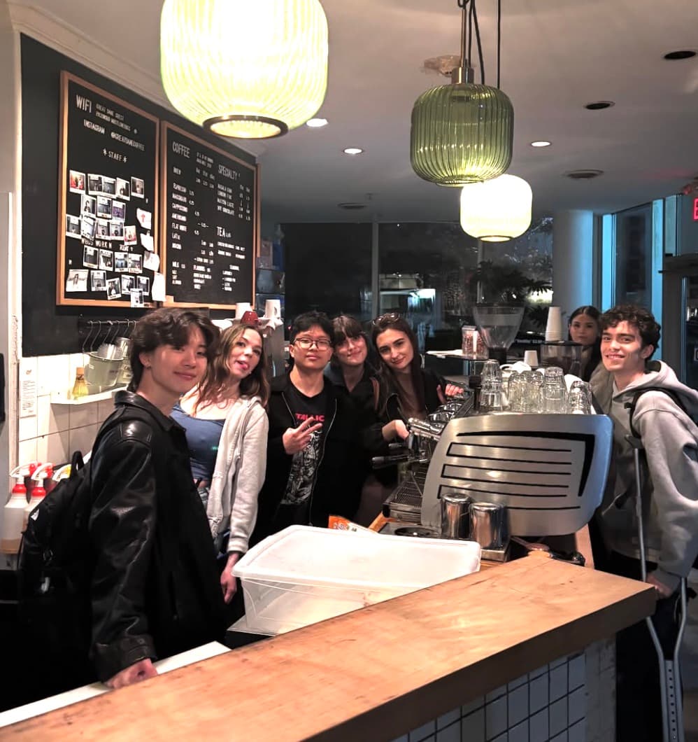 the Great Dane Coffee crew behind the espresso bar at close